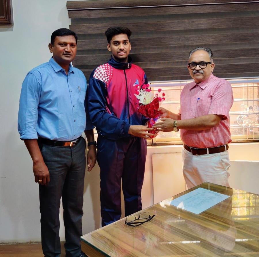 Felicitation of National Basketballer Mr.Wasim Mulla at the hands of Principal Dr.V.A.Patil. Wasim is the first Basketballer of Kolhapur District among  Boys to play National in Junior U18 Category